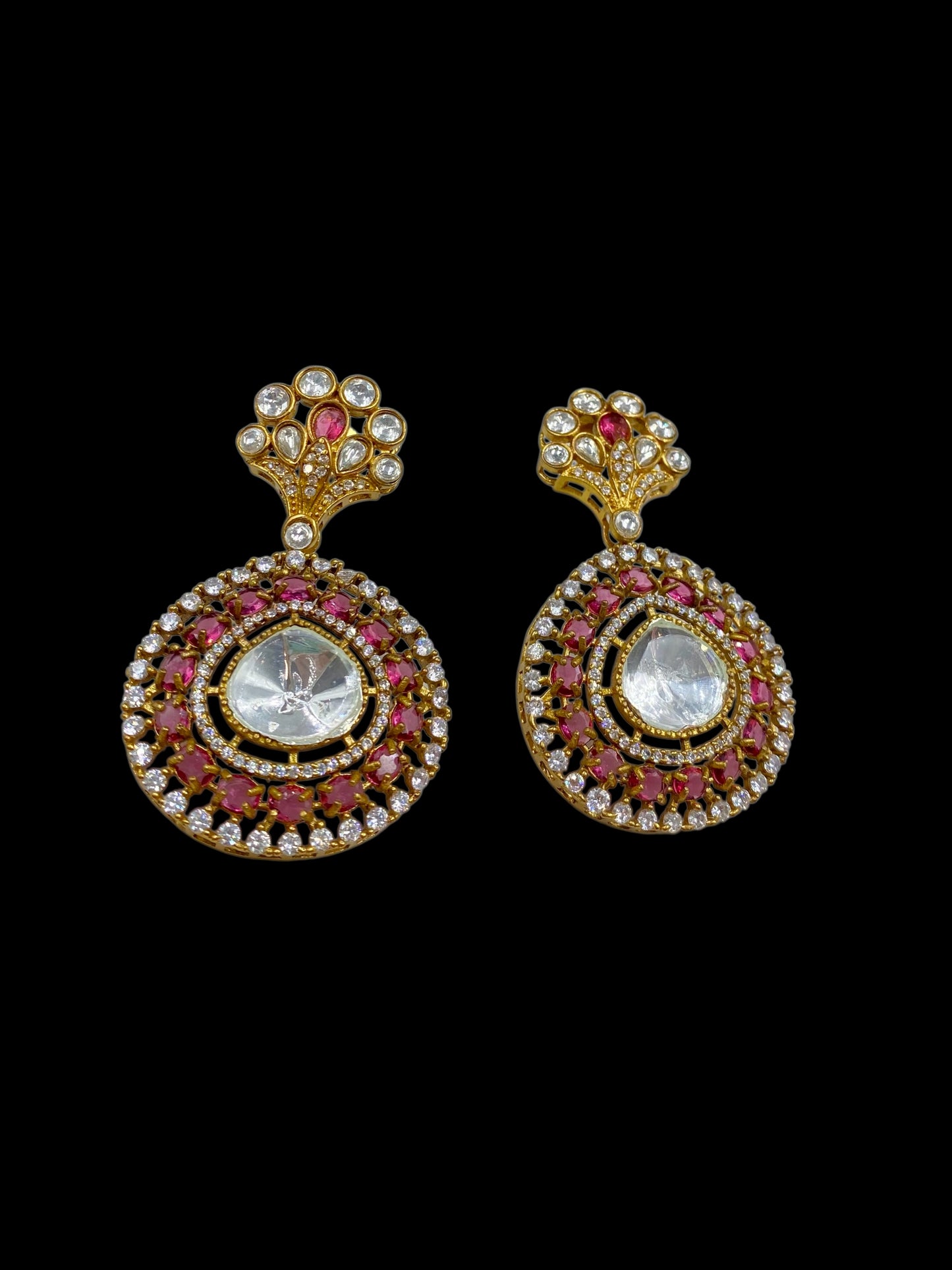 Kumudini – Ruby circular polki studs with festive glow.