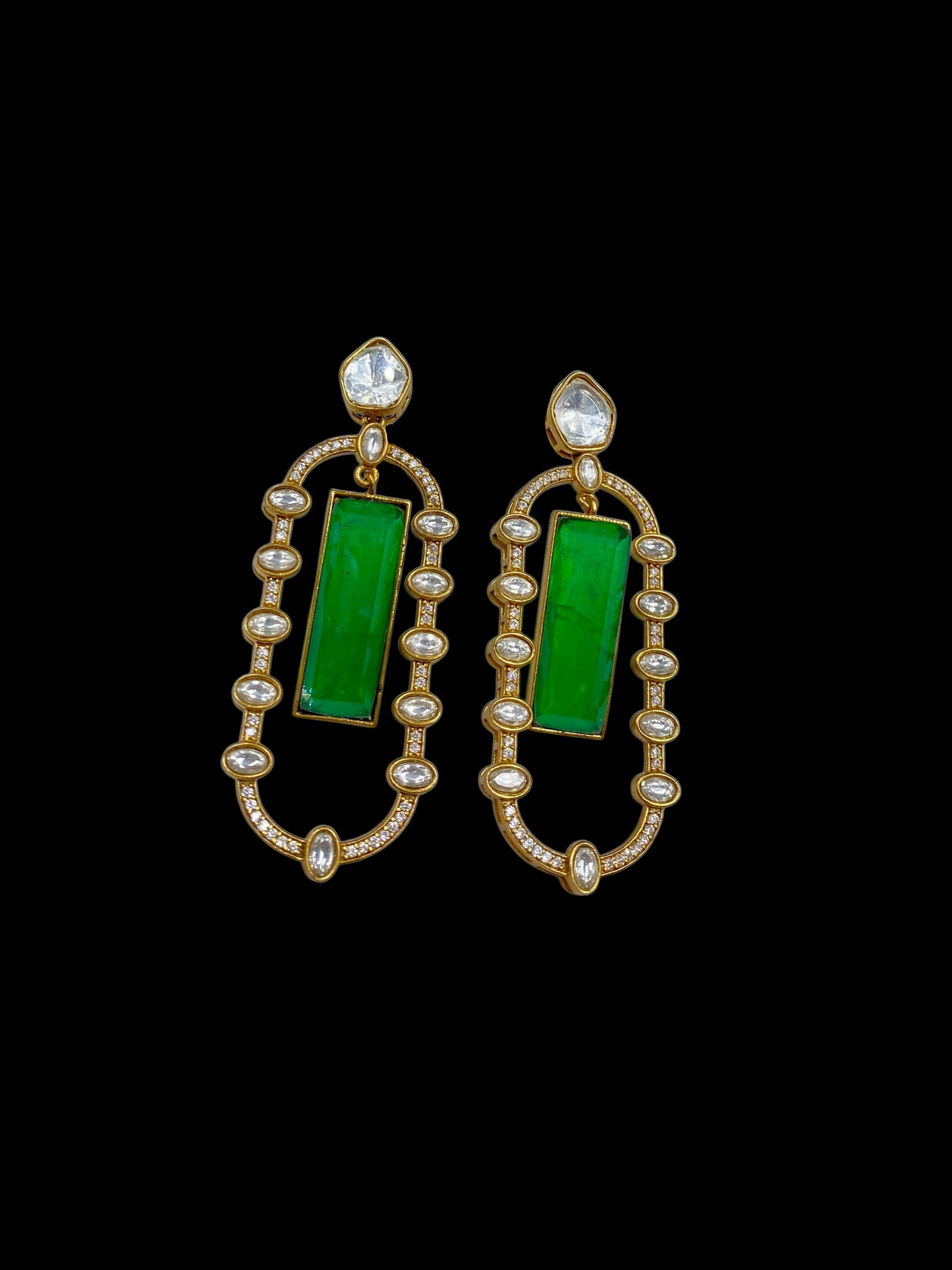 Meher – Diamond and emerald stone earrings.