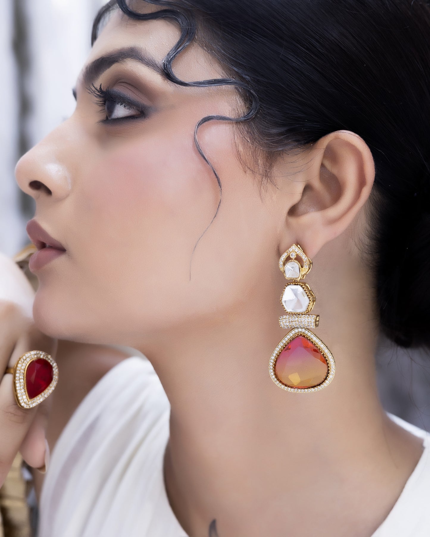 Saanjh – Sunset-hued teardrop danglers with brilliance.