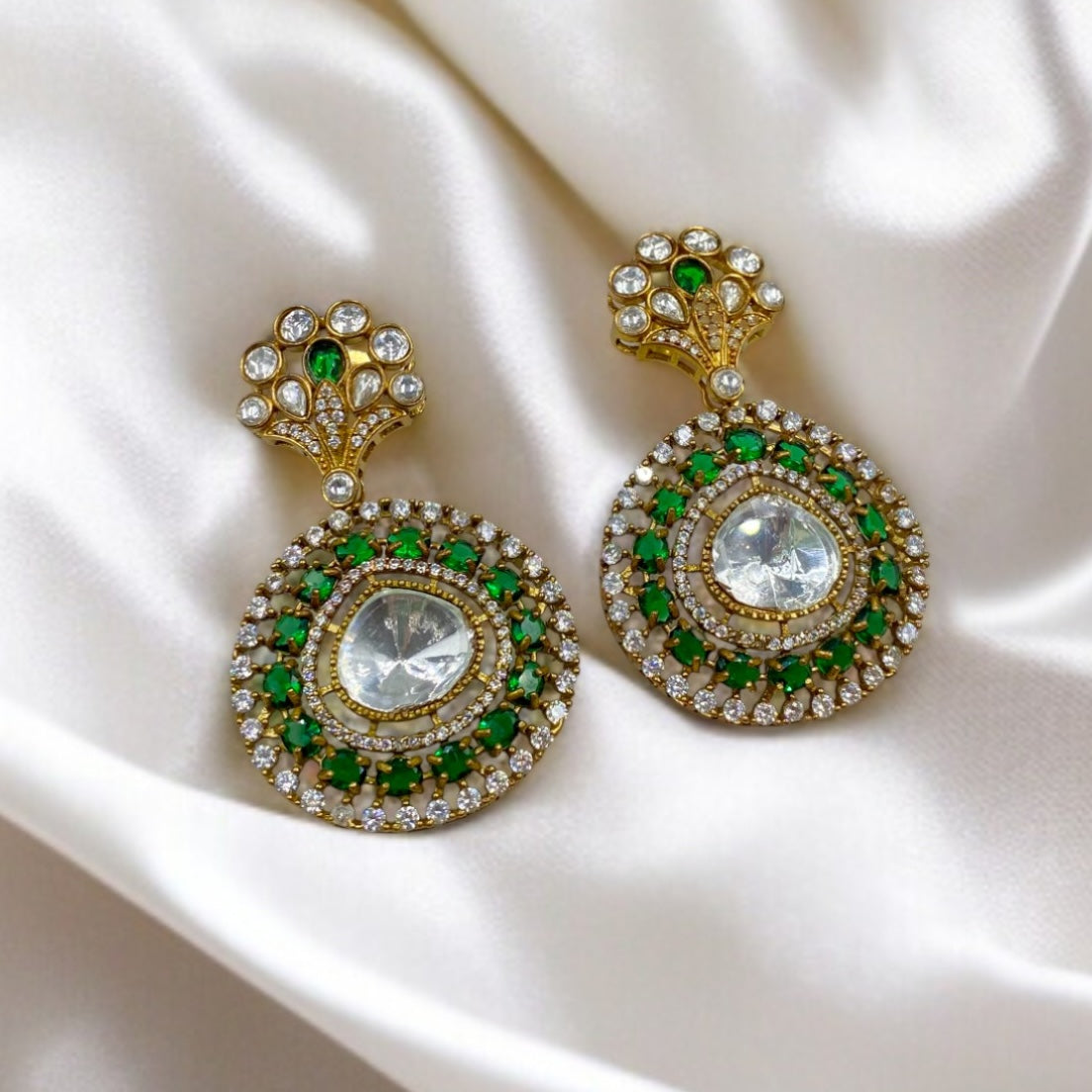 Indira – Green circular polki studs with grandeur.