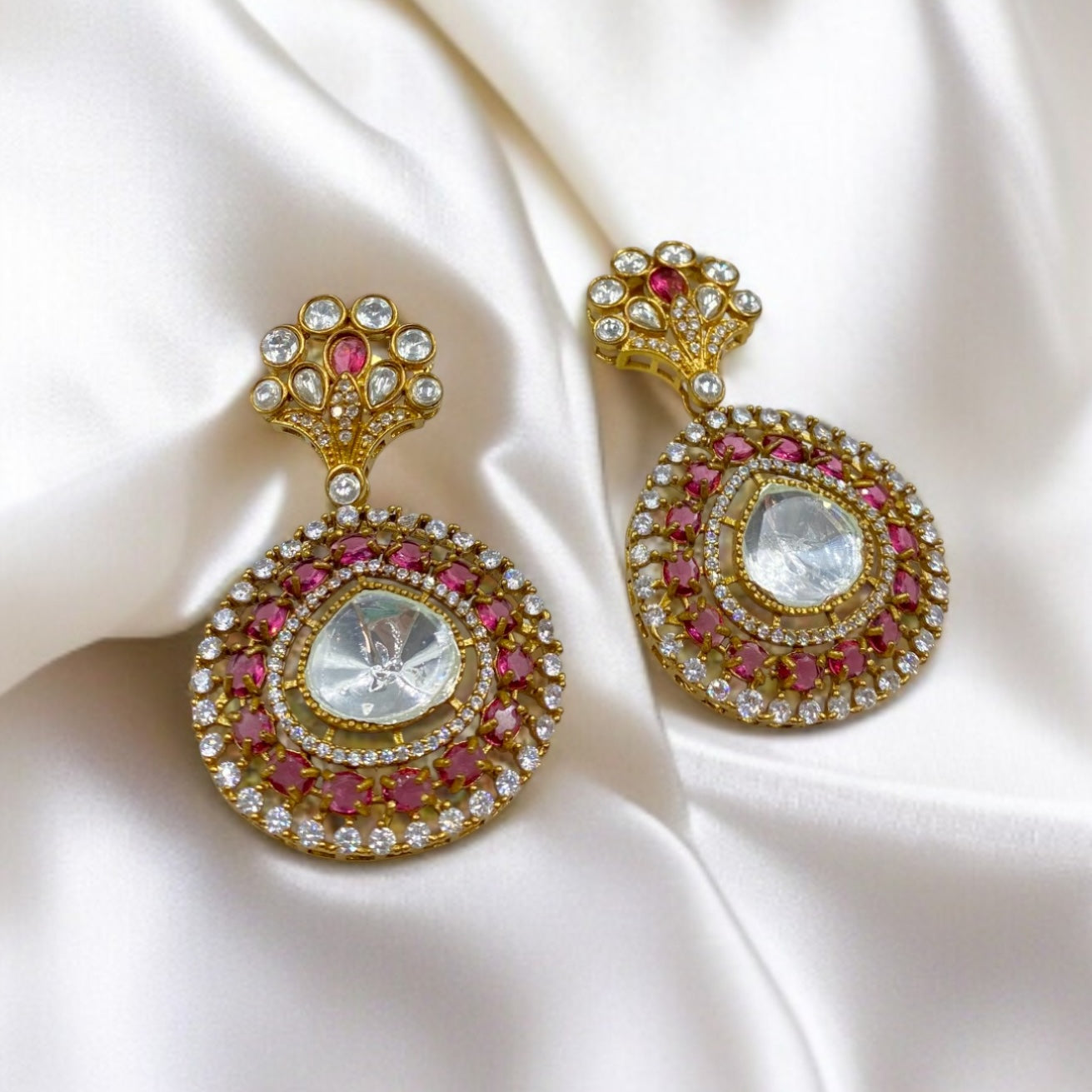Kumudini – Ruby circular polki studs with festive glow.