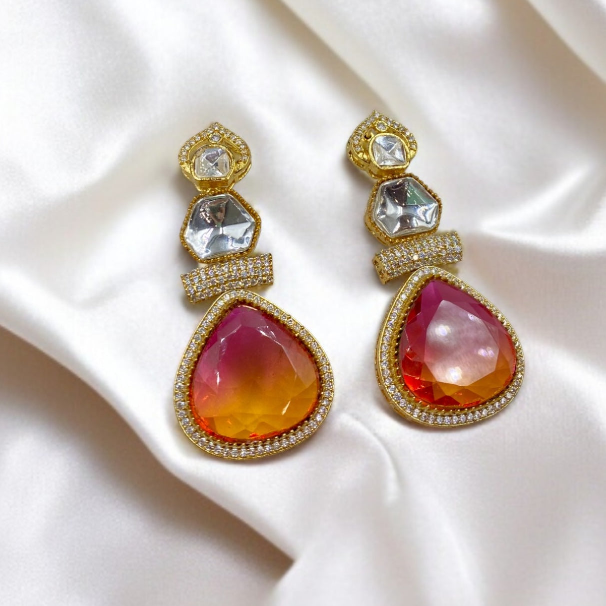 Saanjh – Sunset-hued teardrop danglers with brilliance.