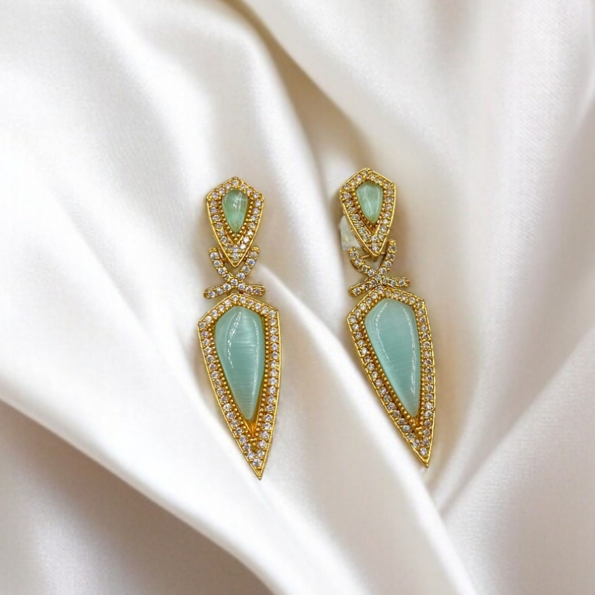Chandrika – Polki and green stone earrings.