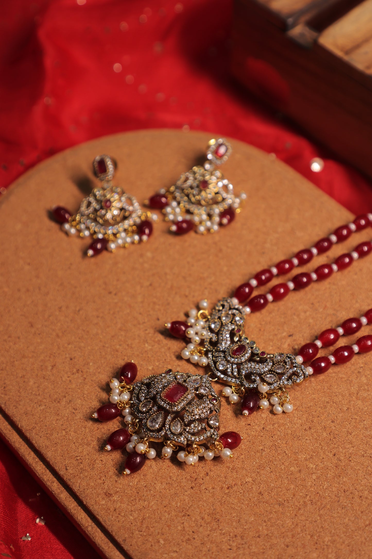 Aaradhya - Polki and Diamond Pendant with Red Quartz Beads and Earrings