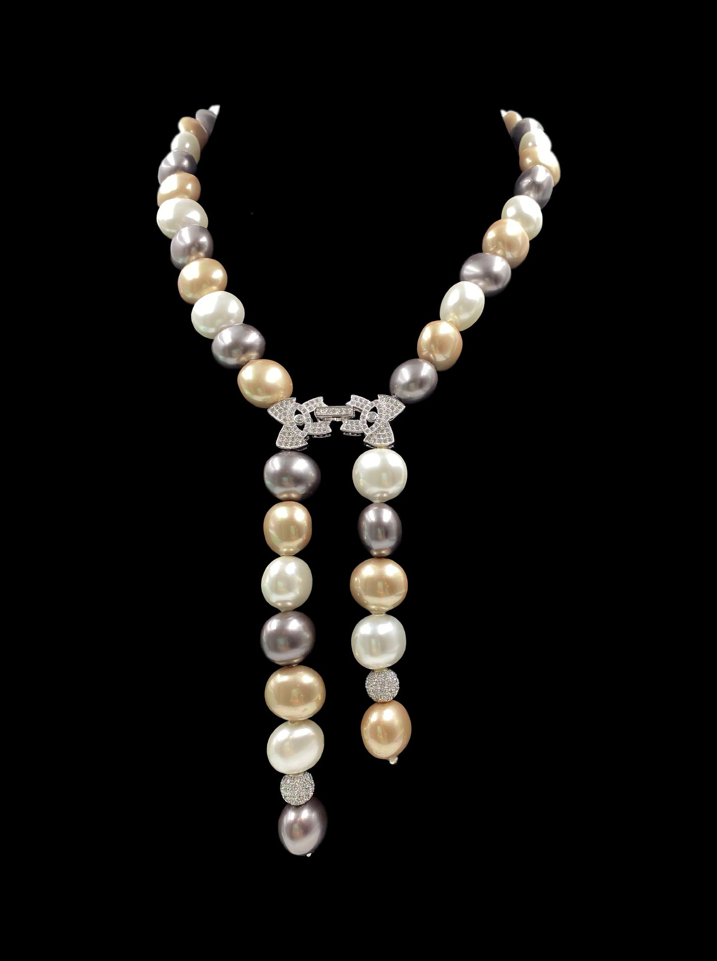 SHELL PEARLS AND CRYSTAL SWAROVSKI KNOT NECKLACE