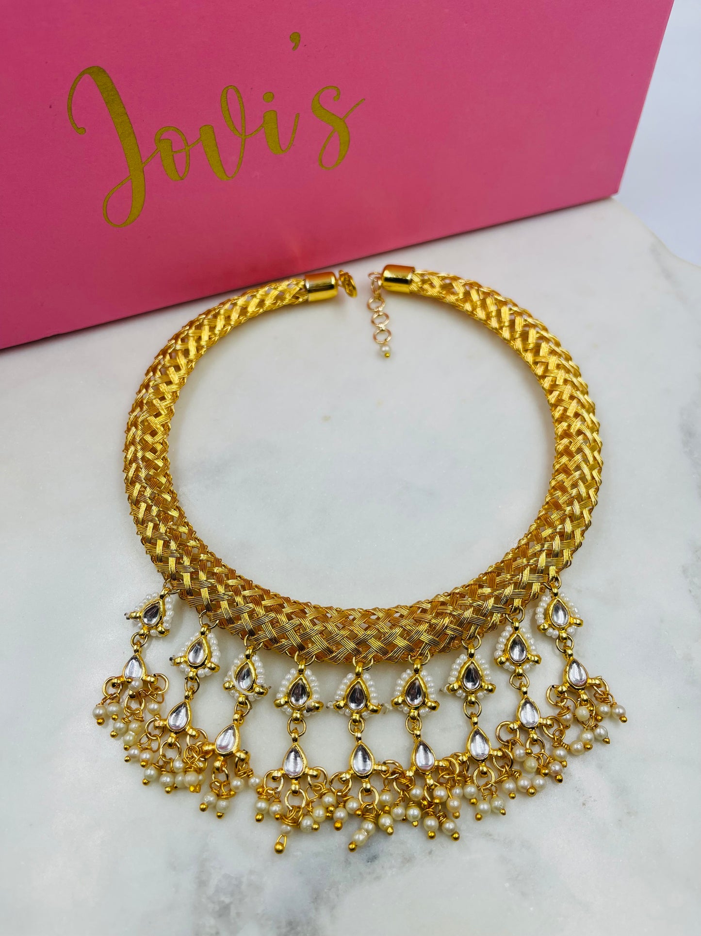 Golden Kundan Hasli with Kundan and Pearl Hangings