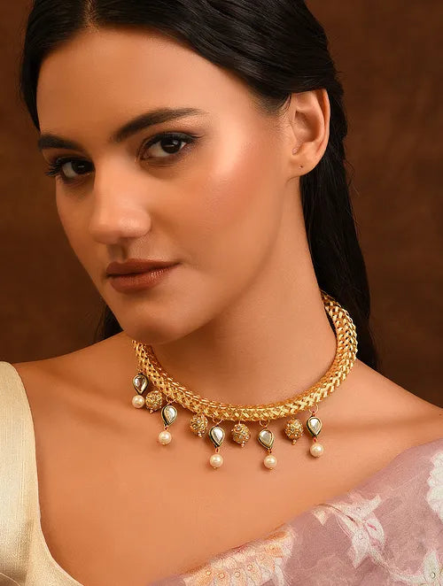 Gold Tone Handcrafted Hasli Necklace with Kundan Accents & Pearls