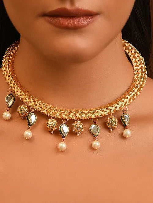 Gold Tone Handcrafted Hasli Necklace with Kundan Accents & Pearls